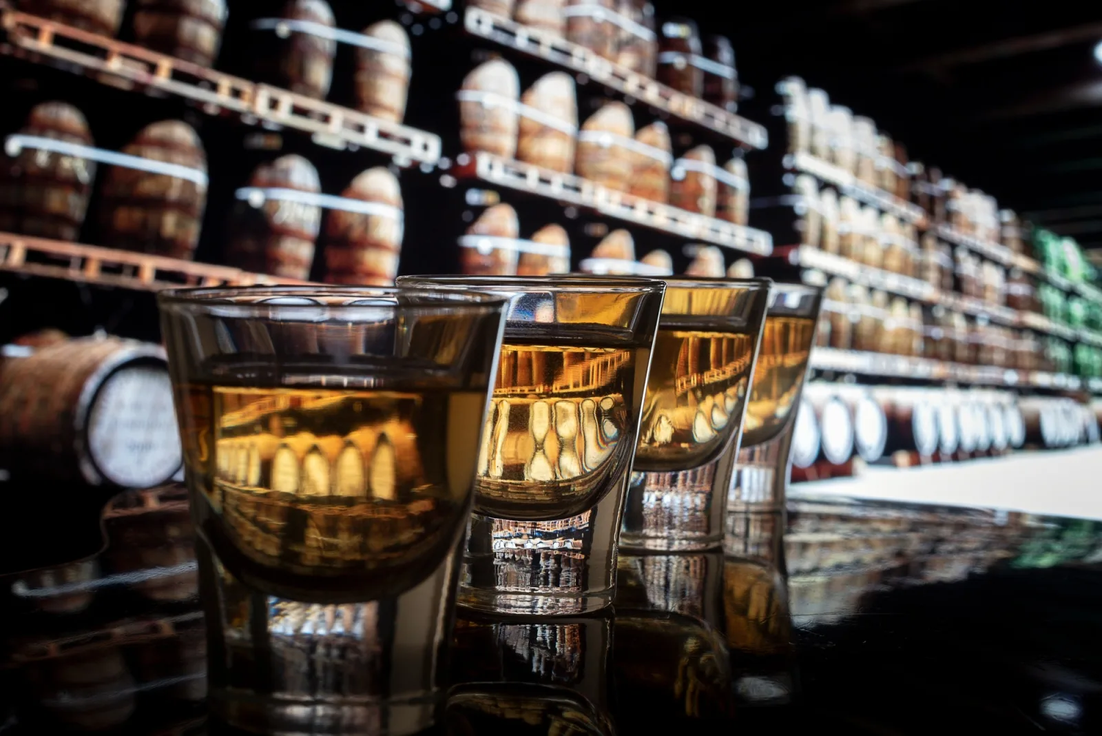 Shots of whiskey on bar counter